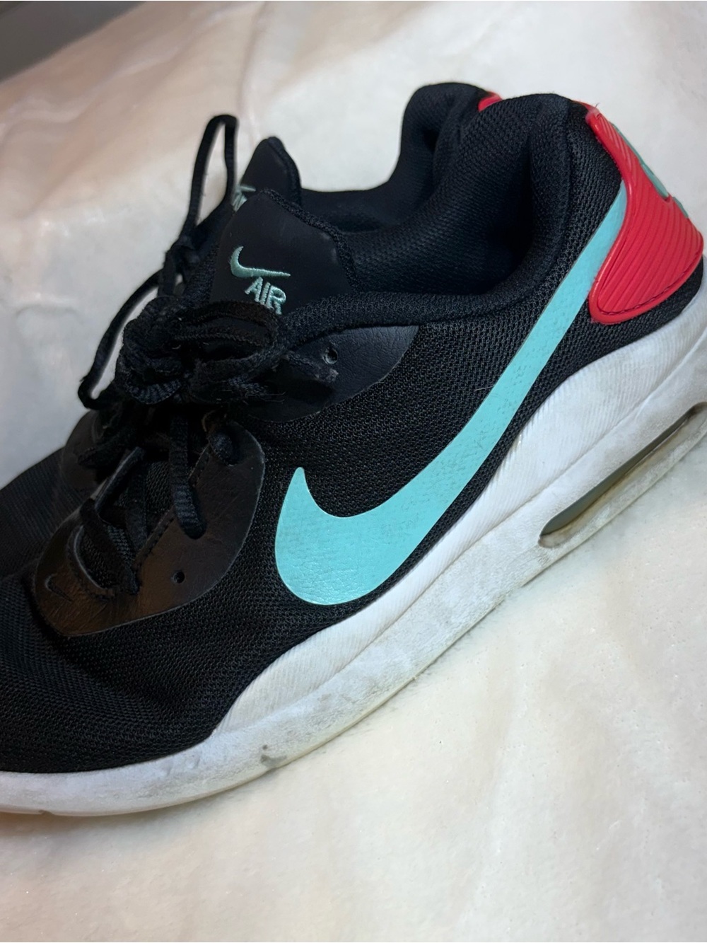 Nike Black Sneakers with Teal Swoosh and Coral Heel